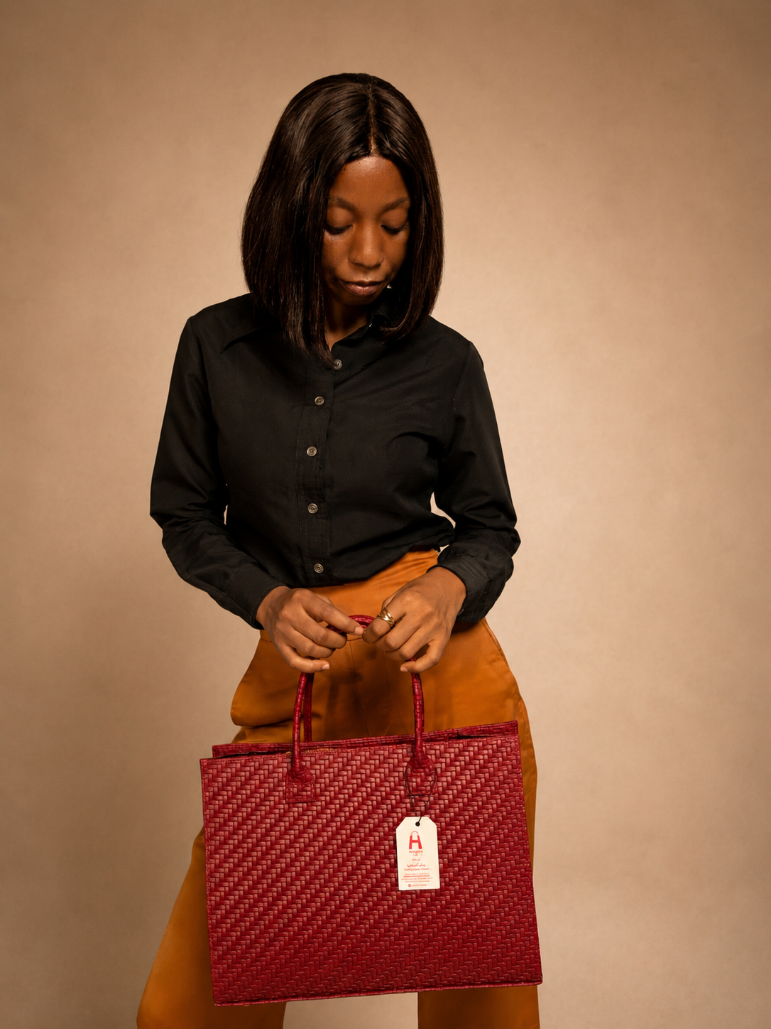 A boxy silhouette,  structured boxy silhouette, , rectangular woven tote bag